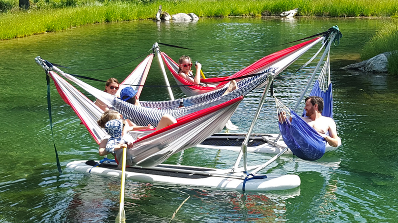 Illustration for article titled Maximize a Lazy Summer Afternoon With This Absurd Raft Full of Hammocks